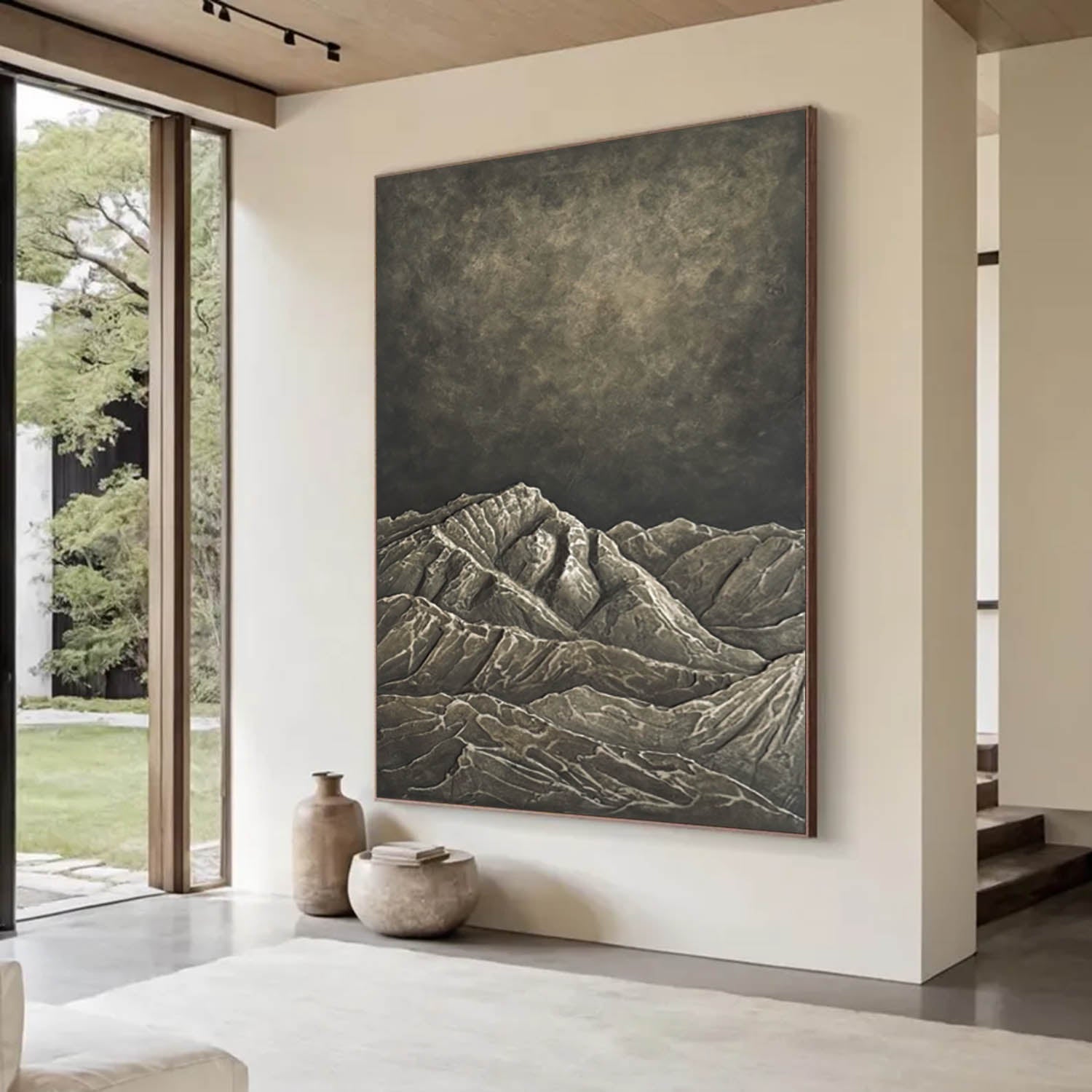 Large abstract mountain painting in a modern living room.