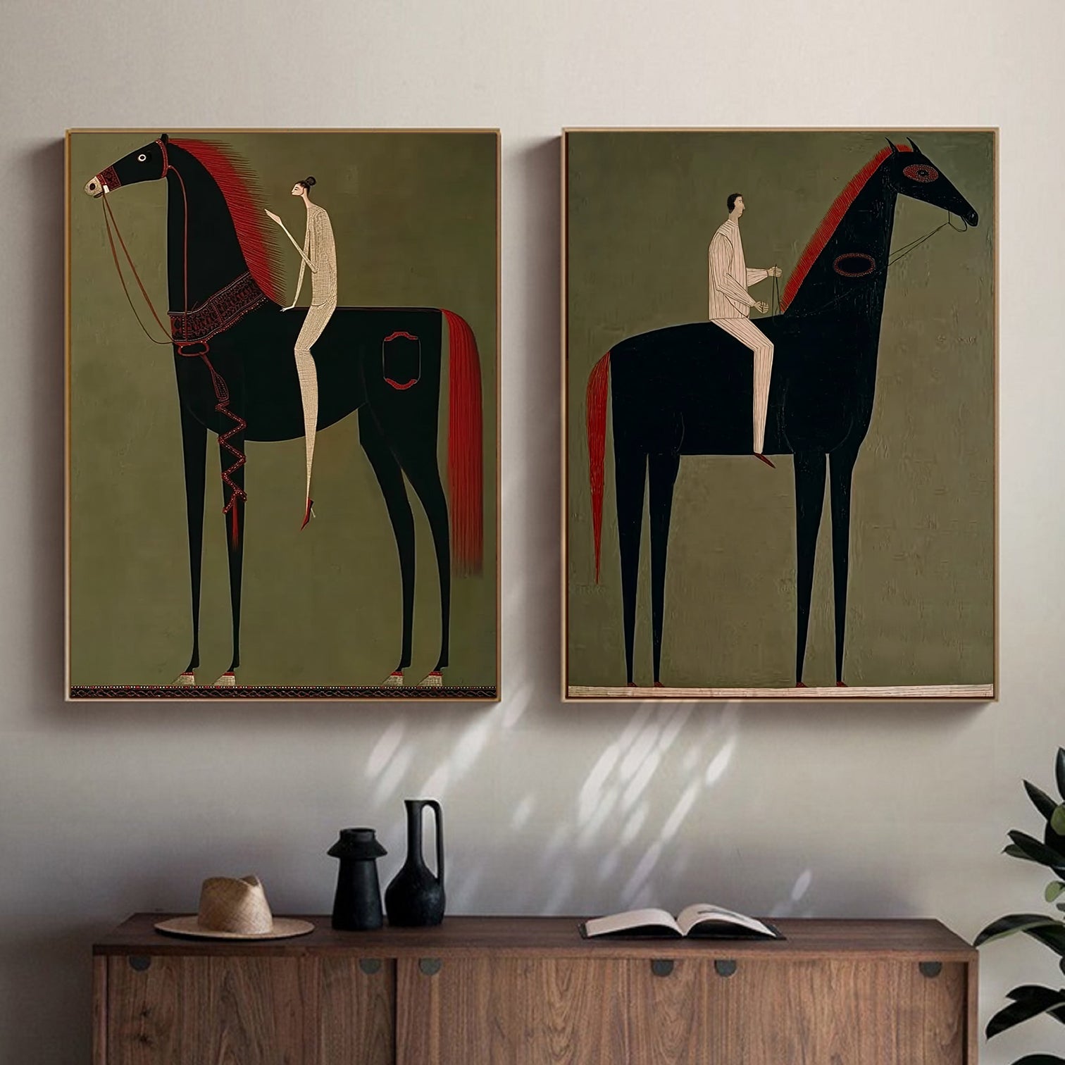 Two abstract paintings of horses and riders on a wall above a wooden cabinet.
