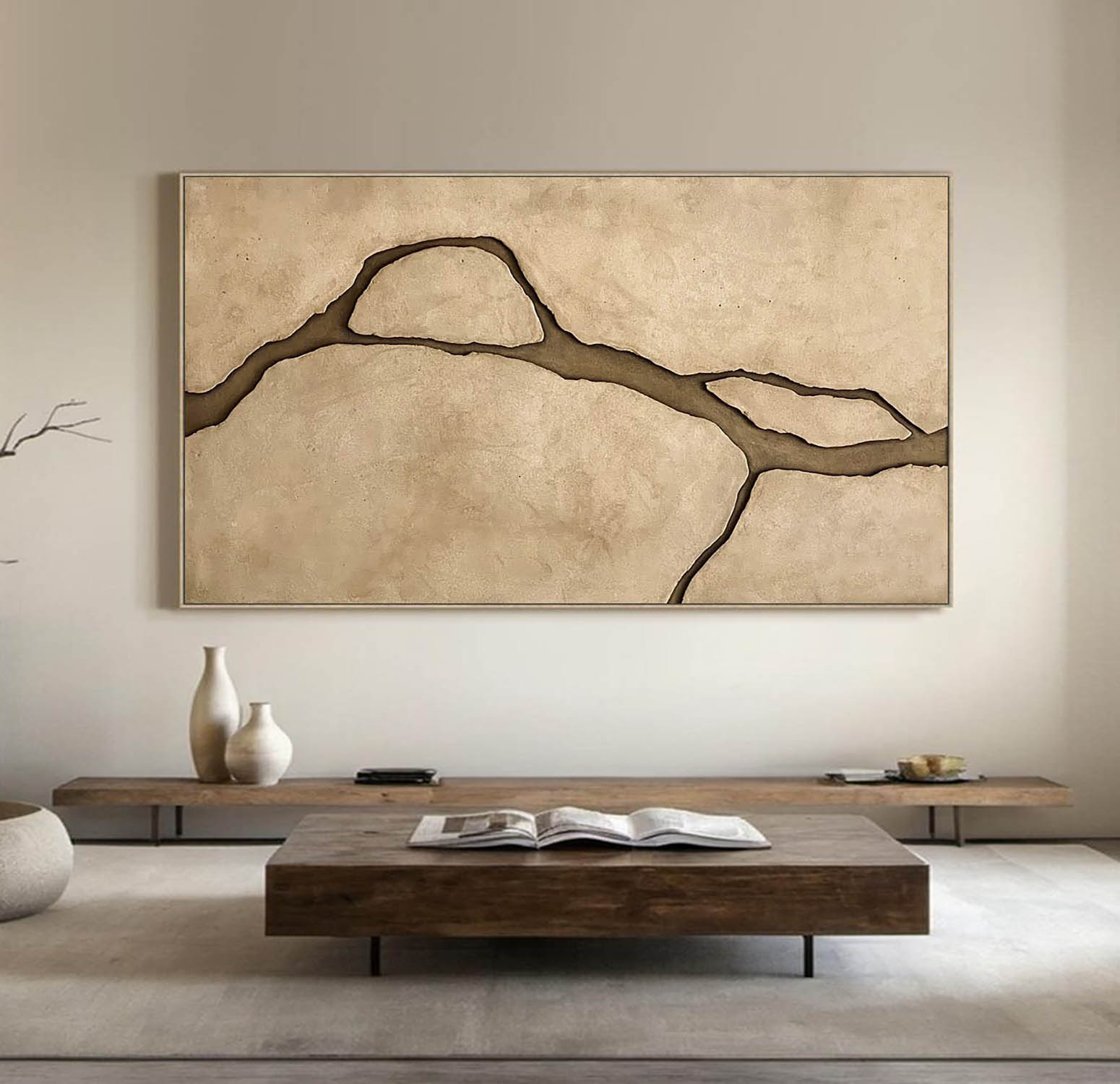 Modern interior with a large abstract wall art piece, wooden coffee table, and minimal decor.