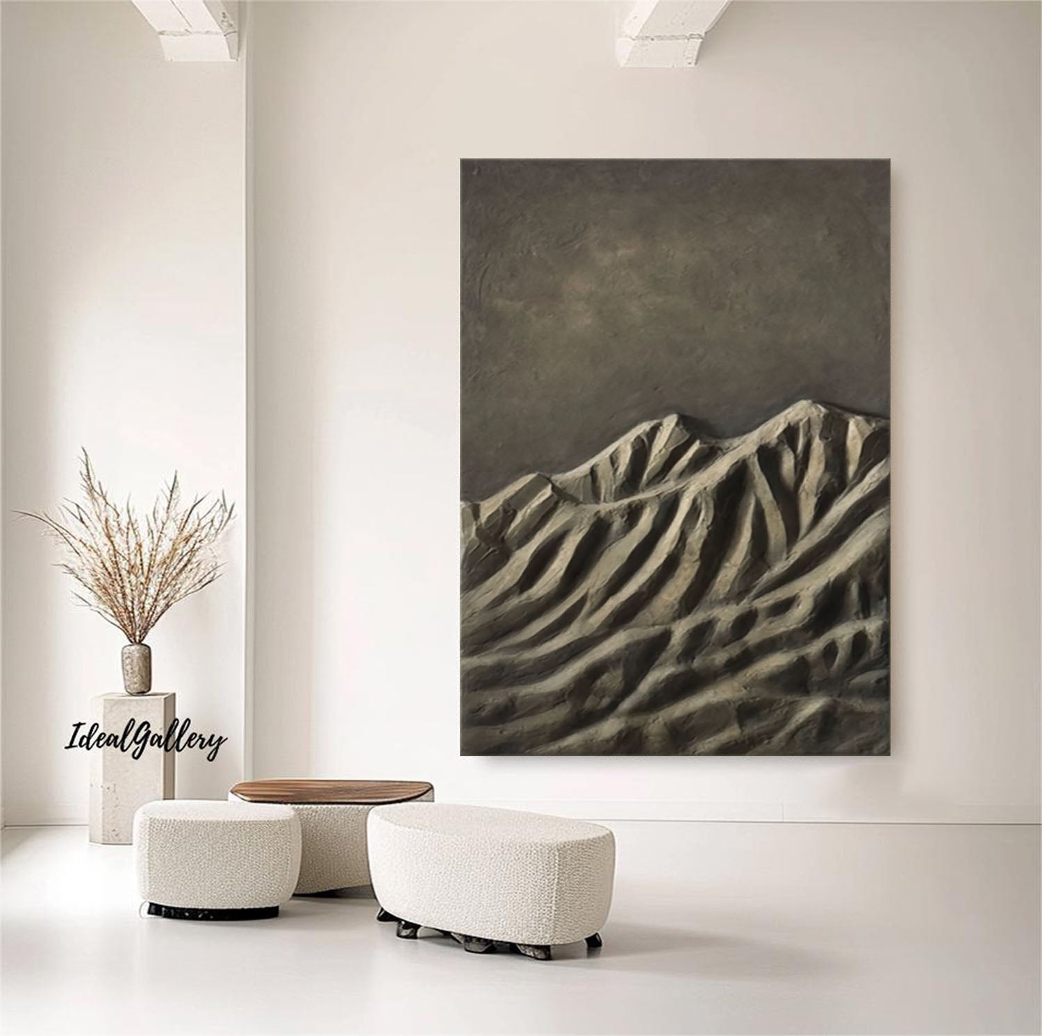 Modern interior with a mountain landscape painting on a white wall, featuring 'Ideal Gallery' branding.