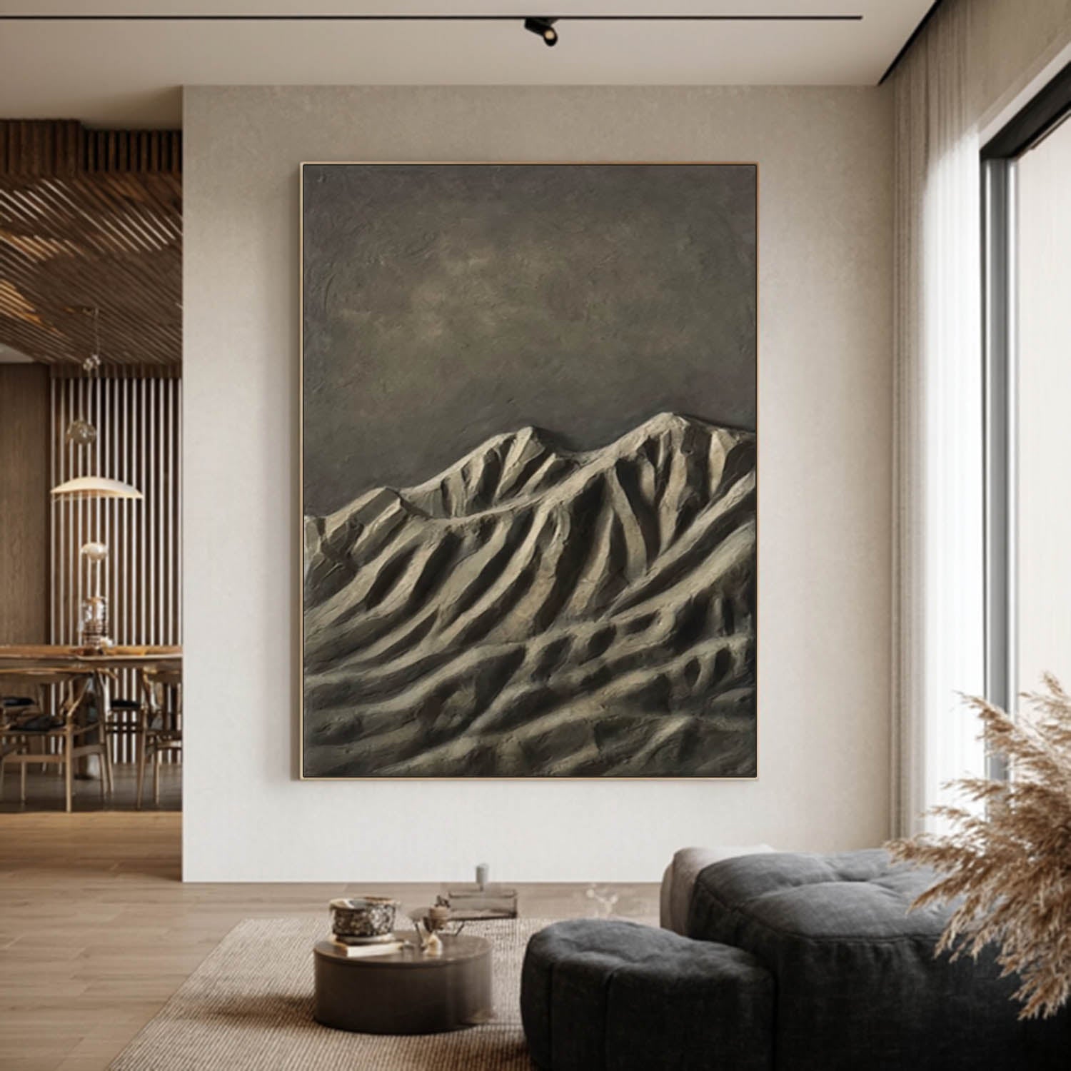 Large abstract mountain painting in a modern living room.